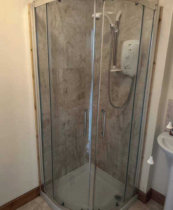 Downstairs shower for rinsing off after fishing or muddy countryside walks - ideal for guests staying near Hay-on-Wye