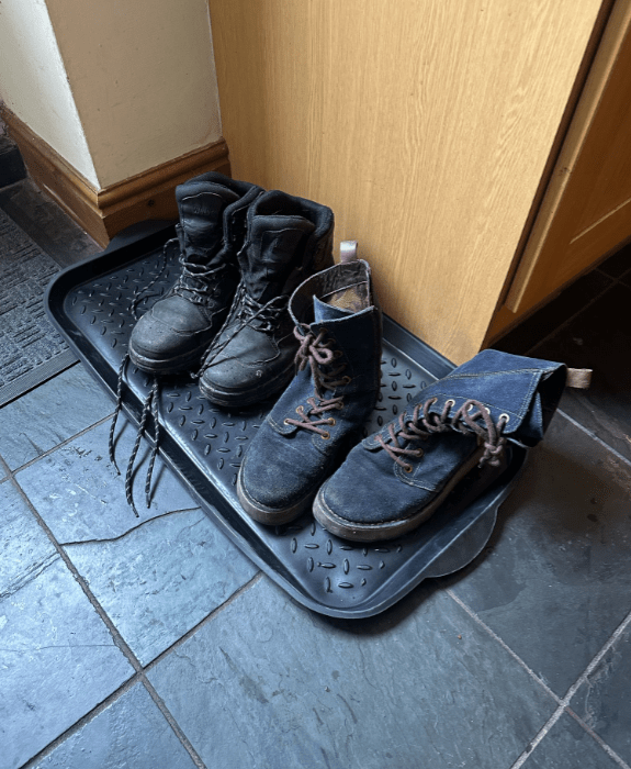 Shoe tray for muddy hiking boots - practical amenity for walkers exploring trails near Hay-on-Wye