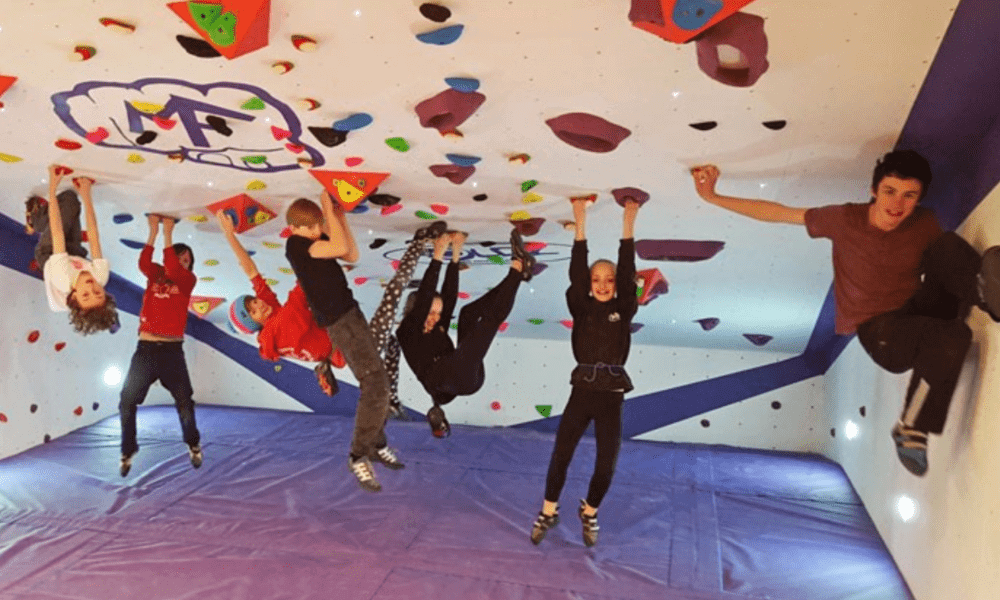 Children's bouldering activity at Llangorse Climbing Centre – fun indoor adventure near Hay-on-Wye