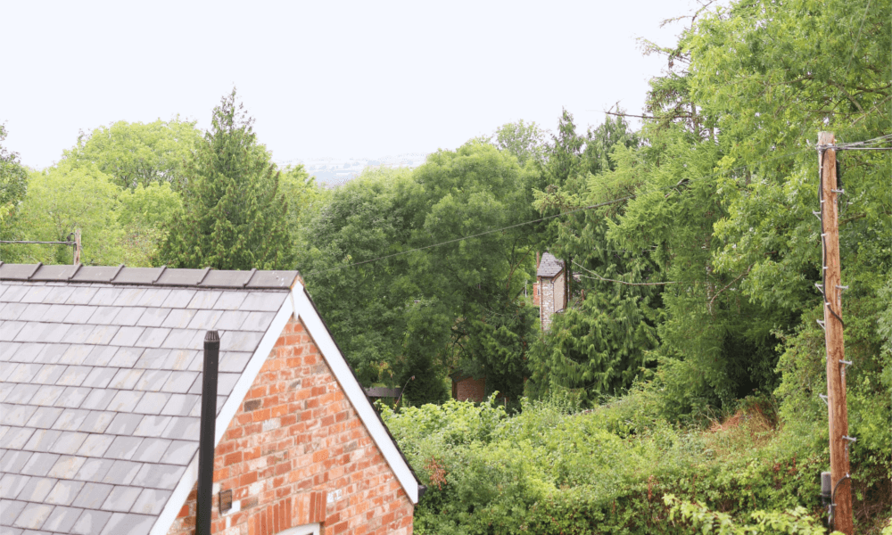 Top-down view of Hay-on-Wye holiday cottage garden with scenic countryside surroundings